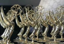 Emmy statuettes in rows