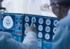 Measles Outbreak Turns Deadly – Teen Brain Attack Doctors reviewing brain MRI scans on multiple monitors