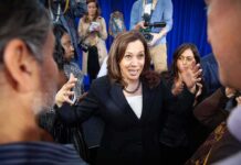 Harris Steps In: Michigan Alliance Forms Kamala Harris speaks to a crowd as Maya Harris stands nearby
