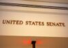 Sign displaying United States Senate in a government building