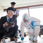Frat Hazing Turned Cocaine Assembly Line Forensic investigator collects evidence as police and detective observe