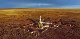 Oil drilling rig at remote desert site