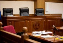 Gut-Punch Testimony Torches Sanctuary Rules empty courtroom with judge's bench and microphones