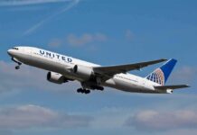 Fighter Escort Plan Scrapped Over Panic Passenger jet taking off against a blue sky