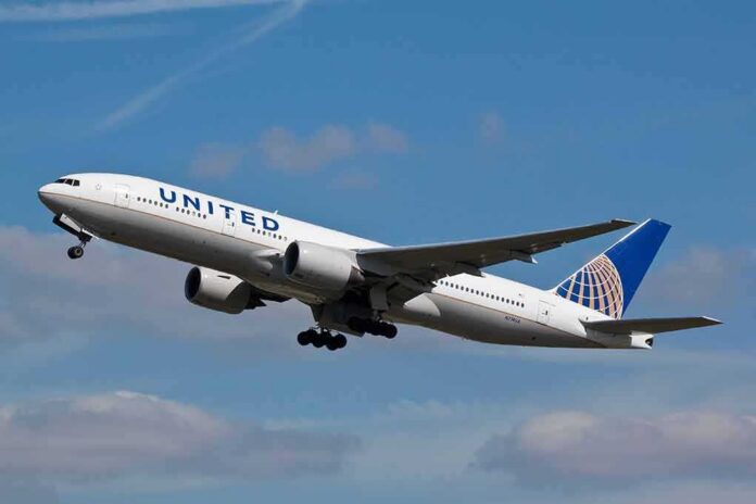 Passenger jet taking off against a blue sky