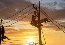 Europe’s Grid BUCKLES — France Goes Dark Utility workers on power poles at sunset