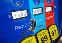 Pump Shock: Mid-August Blows Past $4 Gas pump with prices and sticker on the Extra button