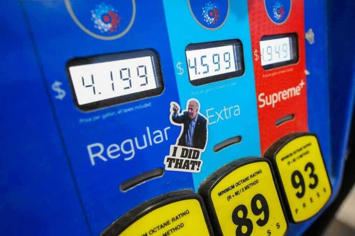 Gas pump with prices and sticker on the Extra button