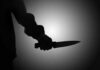Deferred Action Backfires? Stabbing Sparks Sanctuary Showdown Silhouette of a person holding a knife