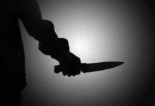 Deferred Action Backfires? Stabbing Sparks Sanctuary Showdown Silhouette of a person holding a knife