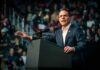 Shapiro Hammers Trump: Chaos, Cruelty, Corruption Josh Shapiro speaking at a podium before an audience