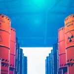 Dangerous Uranium Blind Spot – Blocked Access Risks Nuclear Misstep Radioactive waste barrels stacked in rows inside a facility