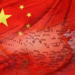Beijing’s Mortgage Timebomb: 40 Years, Still No Buyers Chinese flag overlaid on a map of China