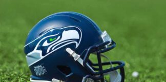 American football helmet on grass
