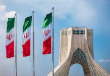 Walkout Shock: Iran Flips Script – Brands America Terrorist Iranian flags beside Azadi Tower in Tehran