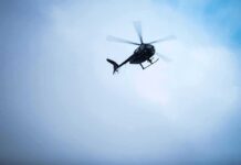 News Chopper Drops Over Crash Scene helicopter flying through cloudy sky