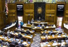 Sanders’ Schools Overhaul Shocks Critics Legislative chamber with lawmakers debating a bill
