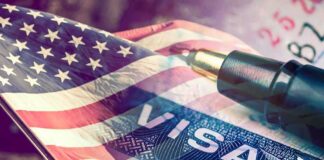 American flag overlaid on a U.S. visa and a pen