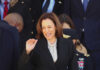 Mississippi Rally Backfires – Awkward Line Stops Harris Cold Kamala Harris waving in a crowd at a formal event