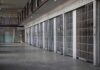 Cellmate Strangled Only 8 Days From Release prison cell block with metal barred doors