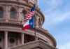 Barbara Bush Check Scrambles Texas Map Texas and U.S. flags in front of a capitol building dome