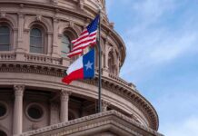 Barbara Bush Check Scrambles Texas Map Texas and U.S. flags in front of a capitol building dome