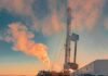 Peace Carrot Or Sanctions Backflip? Oil drilling rig at sunset releasing steam