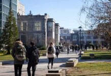 Campus Crackdown Coming? Frats On The Chopping Block students walking on a university campus pathway