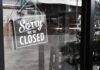 NY Court Slaps Faith-Based Bridal Refusal Closed sign hanging on a glass door