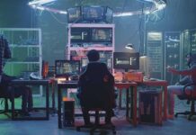 Army Hackathon Supercharges Drone Killers People working at computers in a dim server room