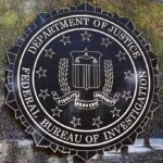 FBI Firings Explode – Political Purge Alleged FBI seal on a building wall