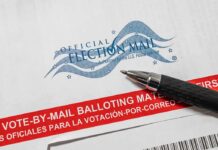 Maryland Detour Stuns Maine Election Watchers Official election mail envelope with pen