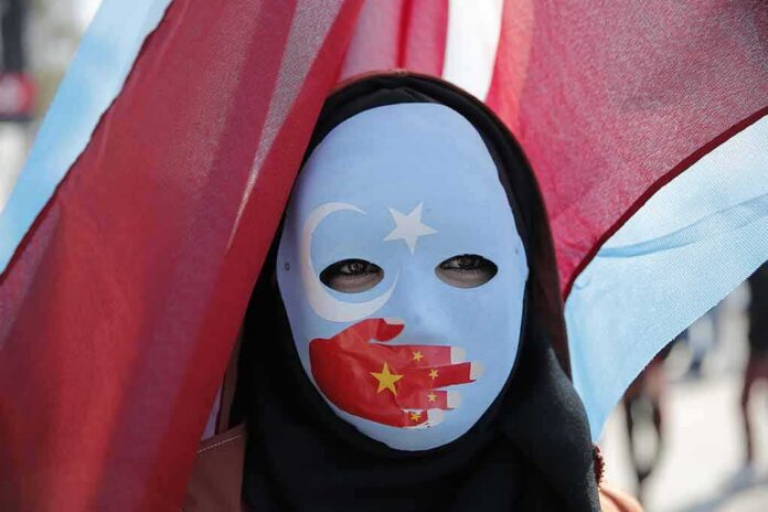 Person wearing a blue protest mask with flags
