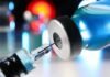 Hate Motive Twist – Syringe Attacks Rattle Midtown Syringe needle entering a vaccine vial