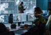Pentagon Power Clash Over Killer Drones Military analysts at computers in a command center