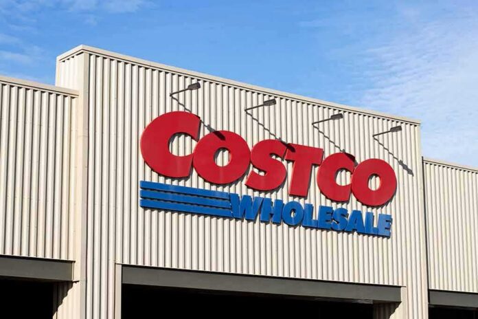 Costco Wholesale storefront sign on a beige corrugated facade