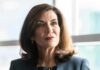 Puppet Charge – Crime Fears Ignite Hochul Firestorm Kathy Hochul in a close-up portrait indoors