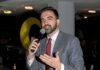 Masked Agents, Child in Car – Mayor Slams ICE Zohran Mamdani speaking into a microphone