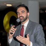 Masked Agents, Child in Car – Mayor Slams ICE Zohran Mamdani speaking into a microphone