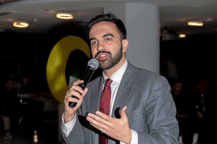 New,York,State,Assemblymember,Zohran,Mamdani,Speaks,In,A,Malikah's Zohran Mamdani speaking into a microphone