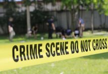 Hero Bystander Ends Rampage – Before Cops Arrive crime scene tape cordoning off a grassy area