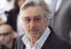 Robert De Niro wearing glasses at an event