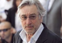 Robert De Niro wearing glasses at an event