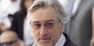 Robert De Niro wearing glasses at an event